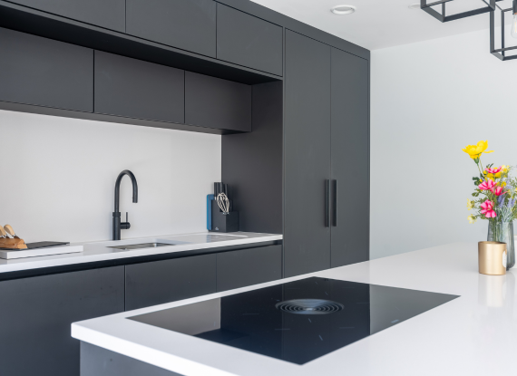 3. Integrated Cooking & Prep Zone Handleless Kitchen Design with Integrated Storage