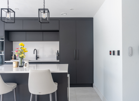 4. Handleless Kitchen Design with Integrated Storage Integrated Cooking & Prep Zone